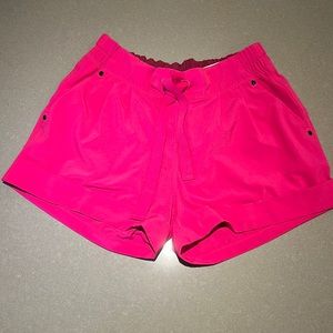 Brand new - never worn - bright pink LULULEMON shorts - size 4